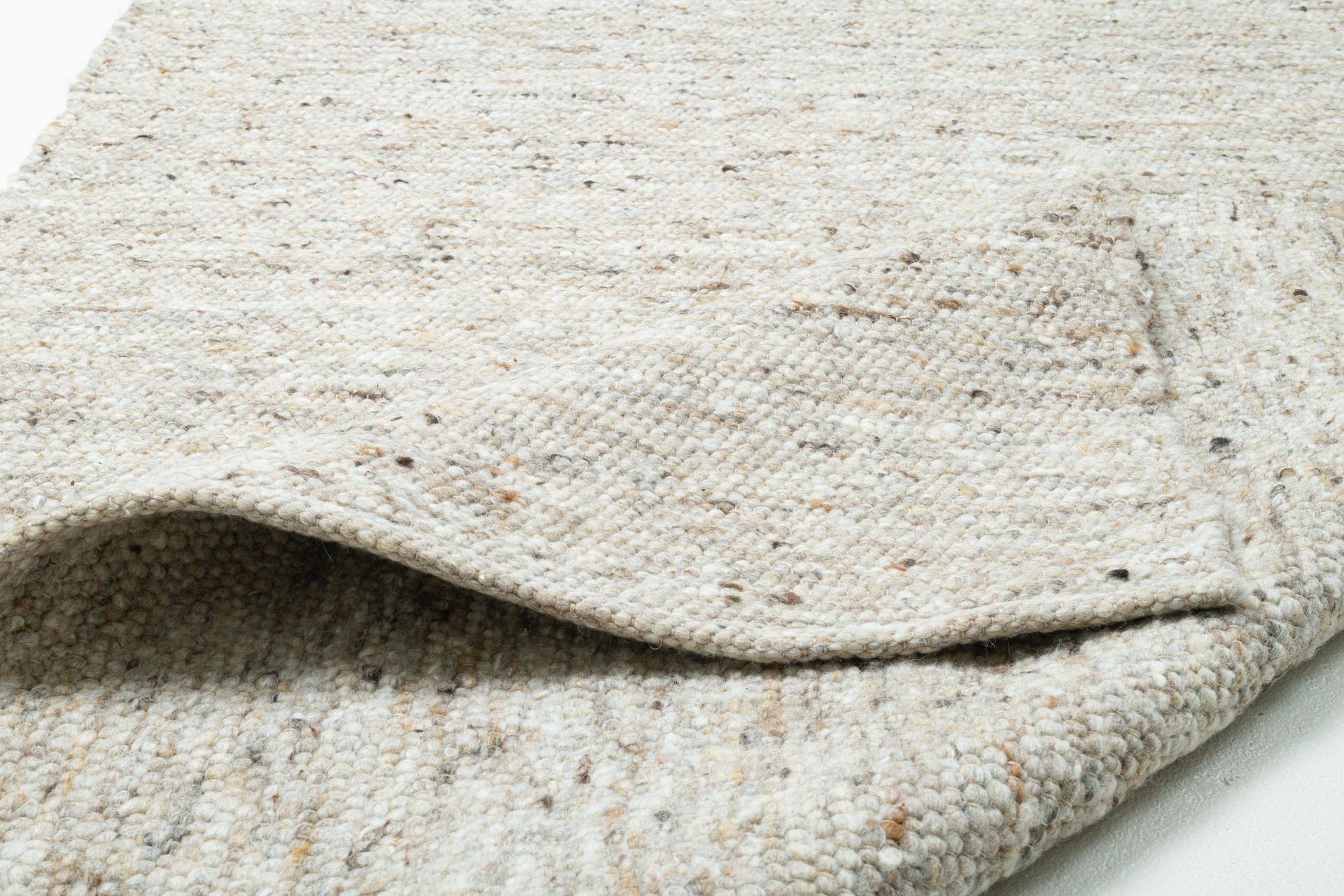 Koberec ALM GLUCK UNI SAND MULTI