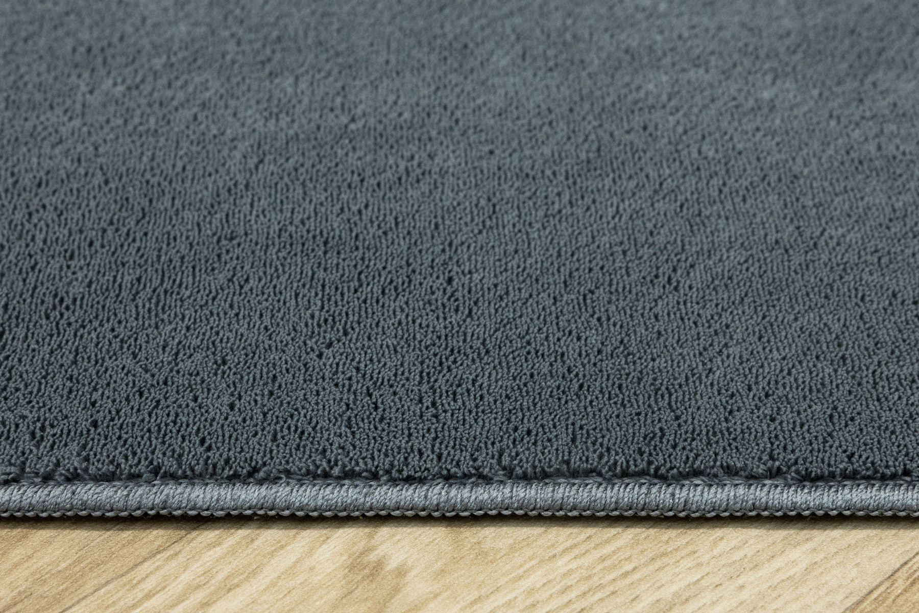 Protiskluzový koberec PLUSH šedý