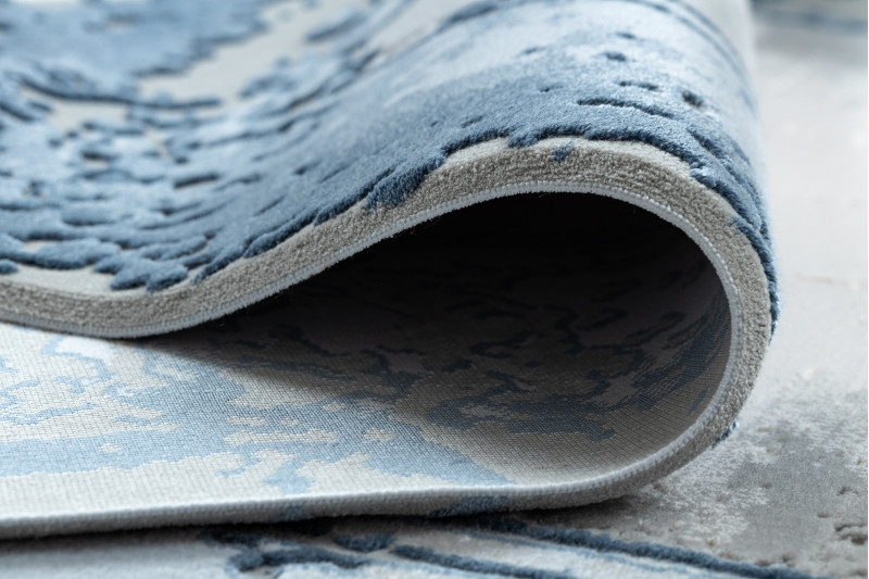 Koberec AKRYL VALS 0A036A C53 46 Ramka slonová kost / nebeský