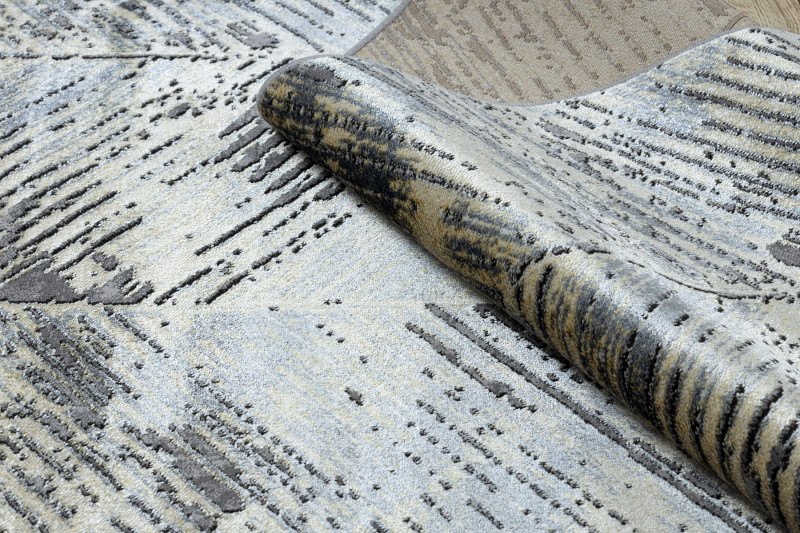 Koberec DE LUXE 2087 Jodelka Chevron vintage - zlatý / šedý