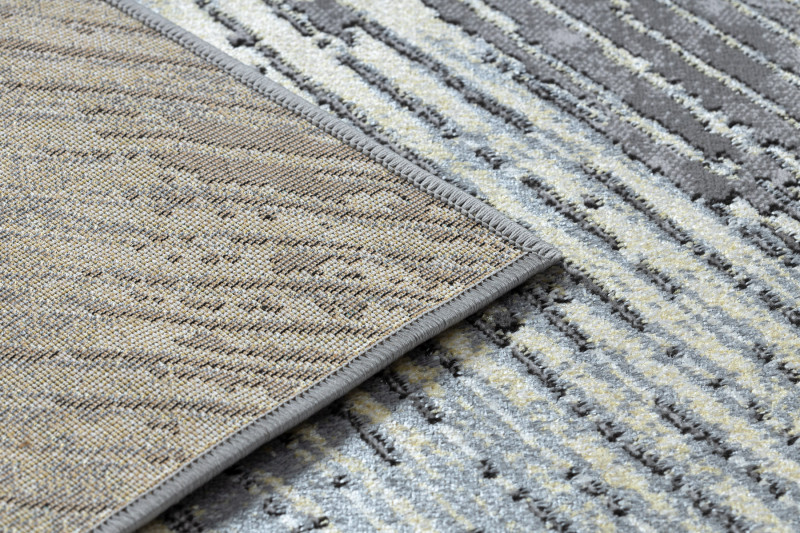 Koberec DE LUXE 2087 Jodelka Chevron vintage - zlatý / šedý