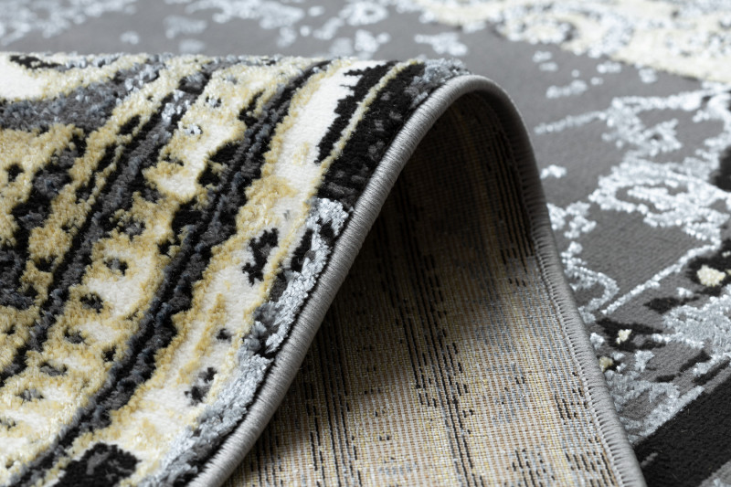 Koberec DE LUXE 628 Ornament vintage - šedý / zlatý