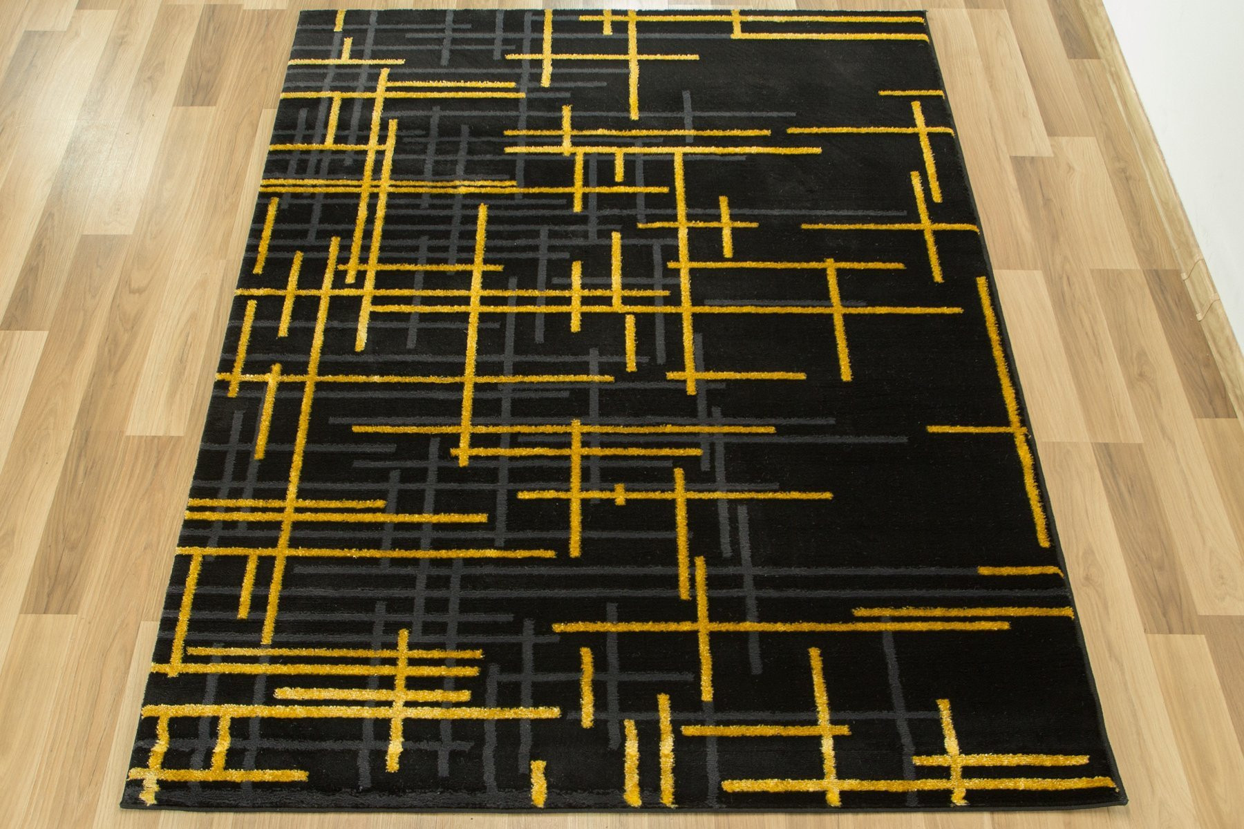 Koberec FESTIVAL 2732A zlatý / černý