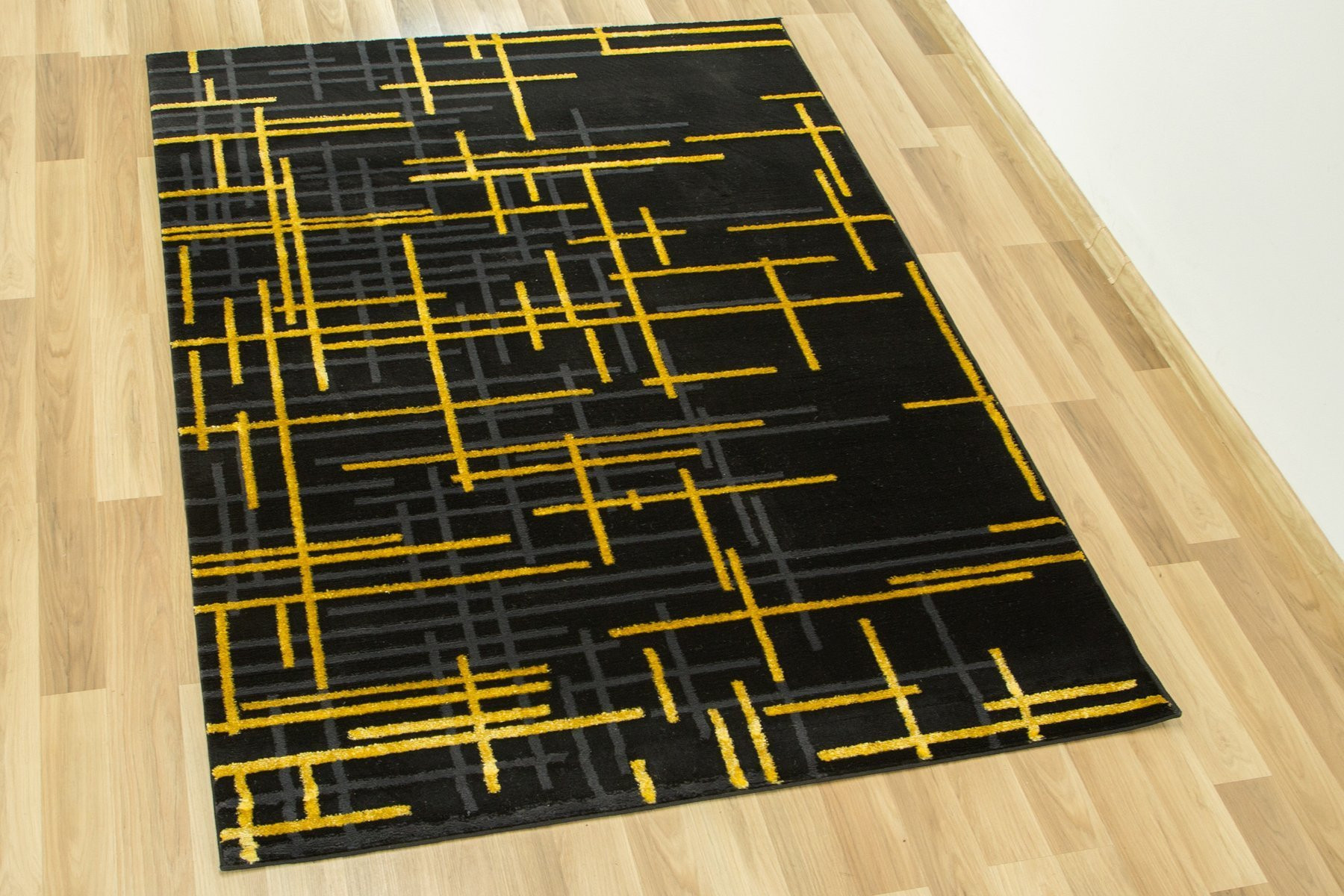 Koberec FESTIVAL 2732A zlatý / černý