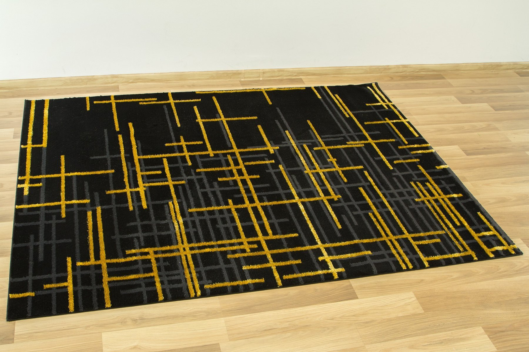 Koberec FESTIVAL 2732A zlatý / černý