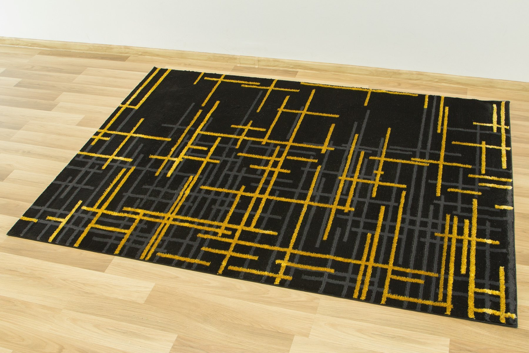 Koberec FESTIVAL 2732A zlatý / černý