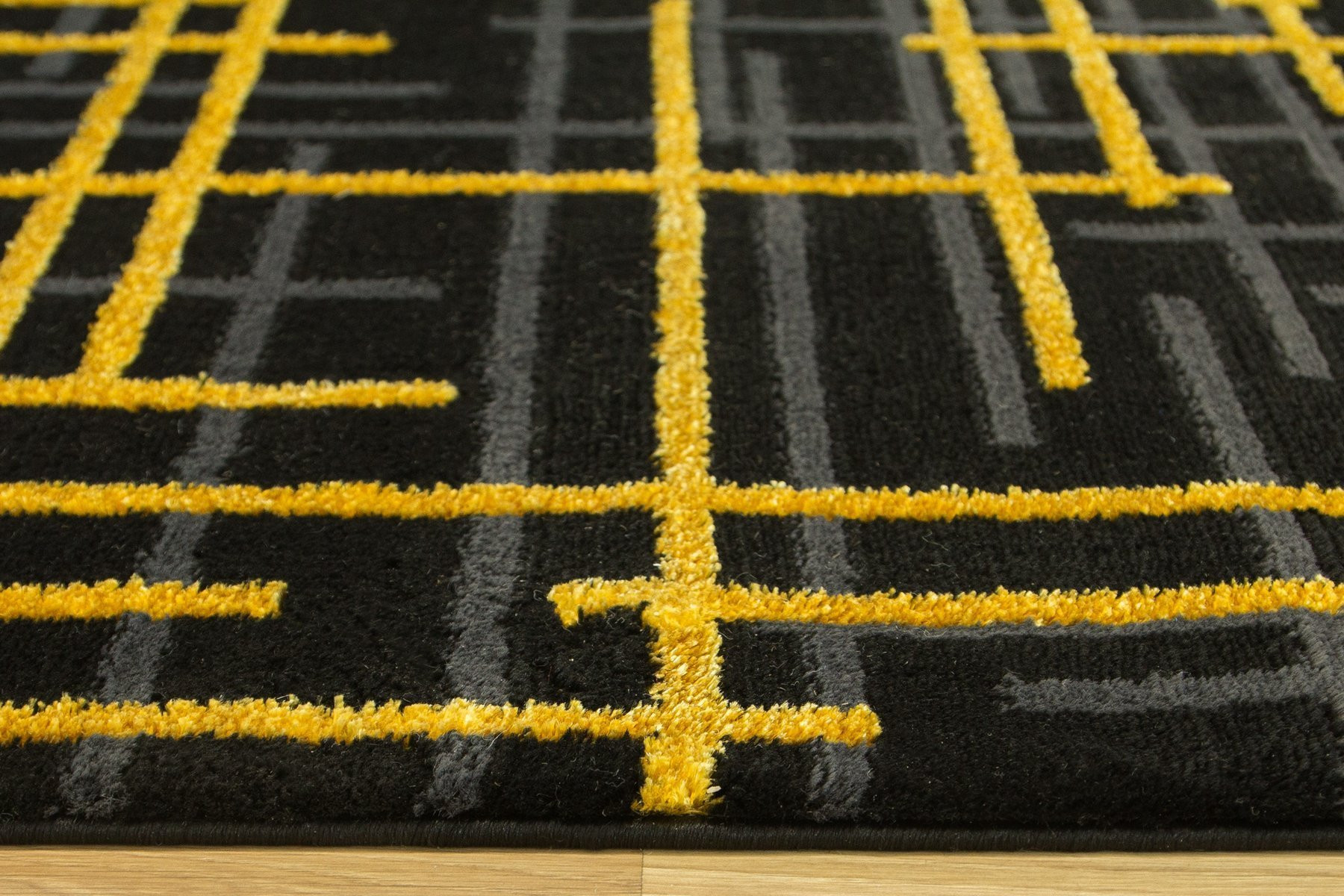 Koberec FESTIVAL 2732A zlatý / černý