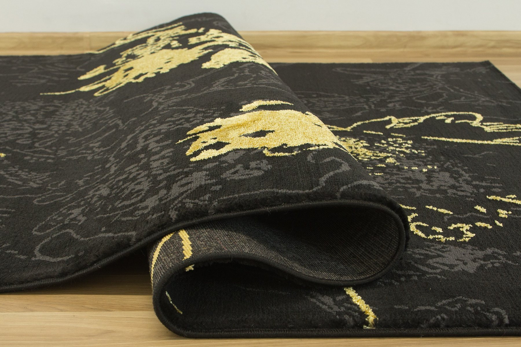 Koberec FESTIVAL 2743A Květy zlatý / černý