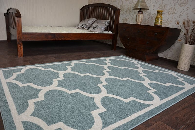 Koberec Sketch F730 tyrkysově / krémový trellis