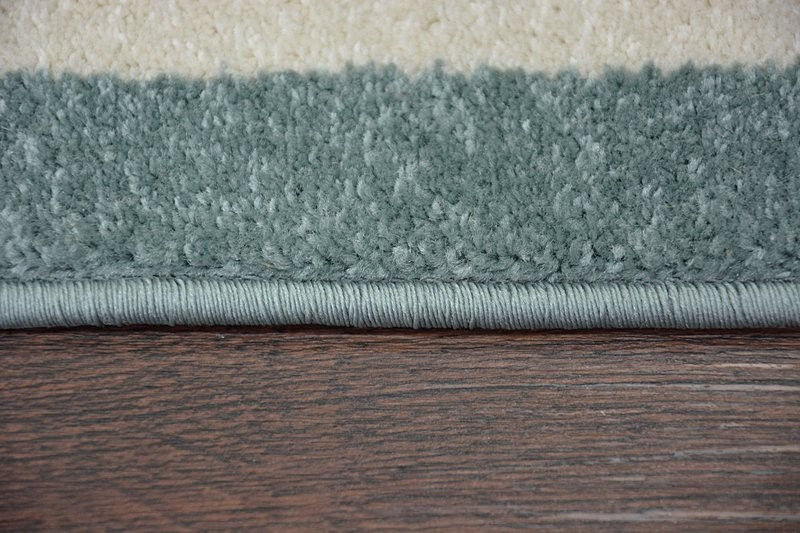 Koberec Sketch F730 tyrkysově / krémový trellis