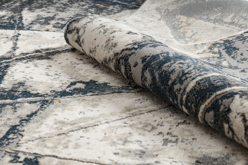 Koberec TULS 51326 sloní kost / modrý