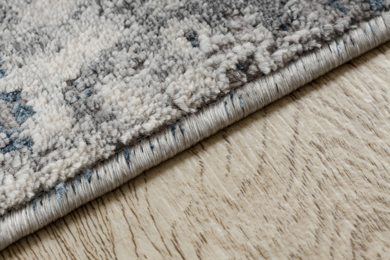 Koberec TULS 51326 sloní kost / modrý