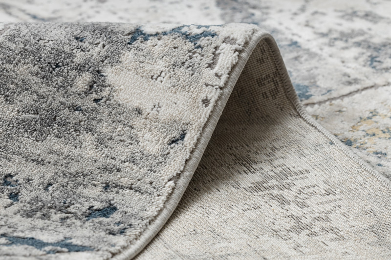 Koberec TULS 51326 sloní kost / modrý