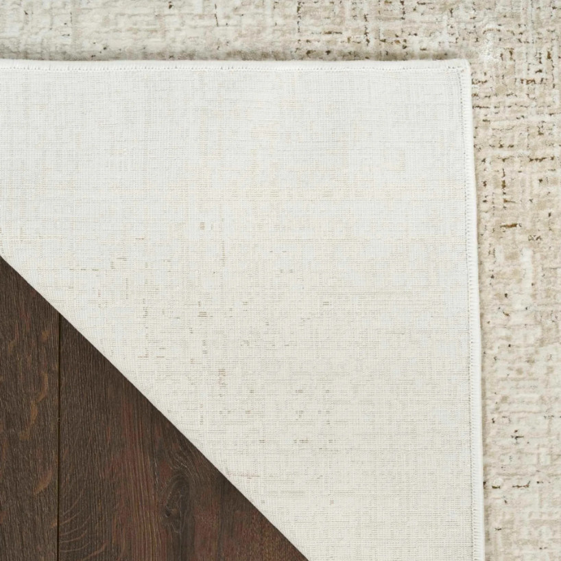 Koberec DKNY Grand Street ivory / béžový