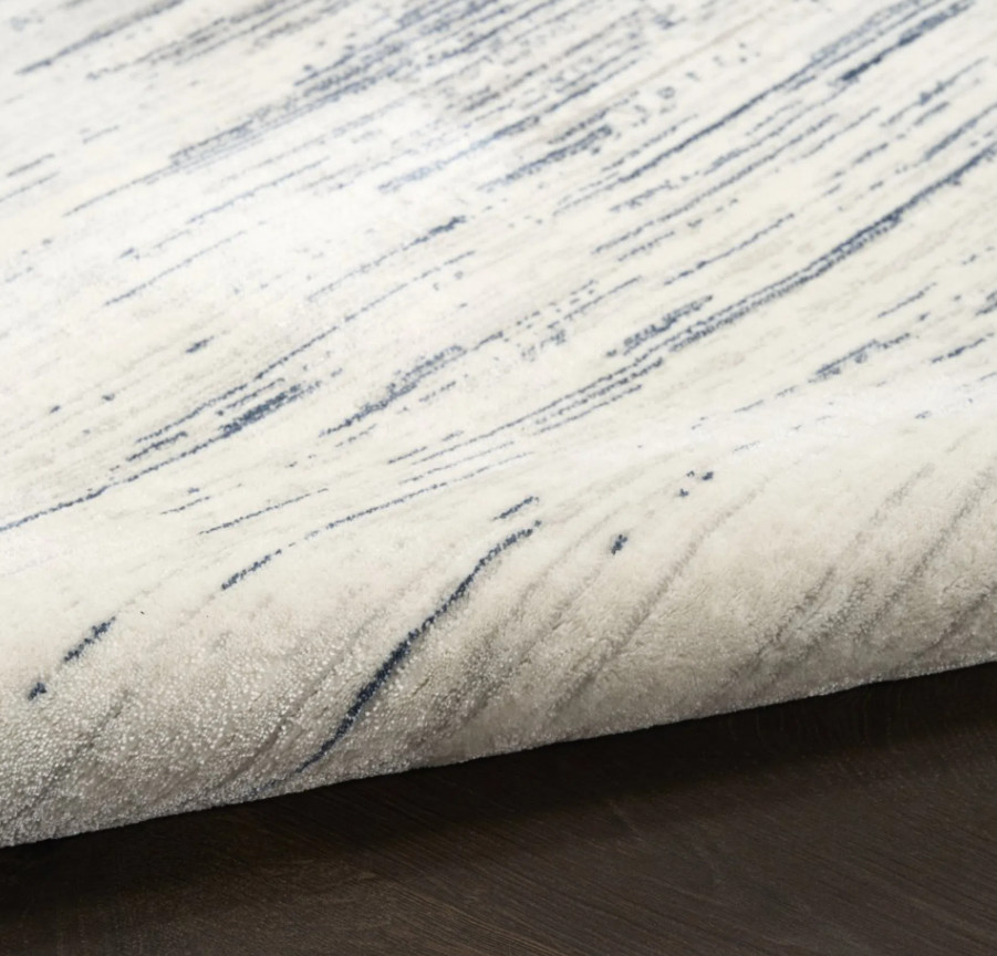 Koberec DKNY Grand Street sloní kost / modrý