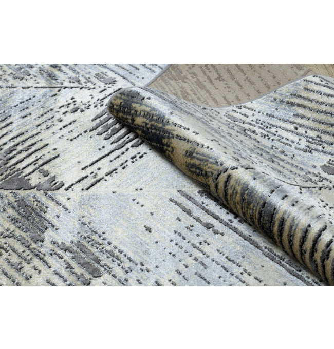 Koberec DE LUXE 2087 Jodelka Chevron vintage - zlatý / šedý