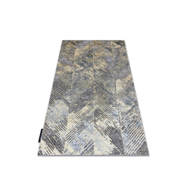 Koberec DE LUXE 2087 Jodelka Chevron vintage - zlatý / šedý